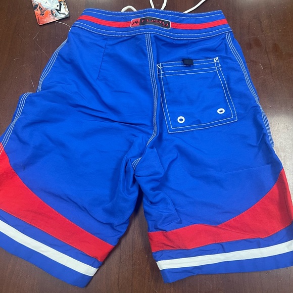 NWT RUSTY BOYS SWIM SHORTS WITH REAR POCKET WAIST 22” length 16” - Picture 2 of 4